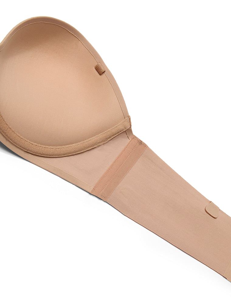Push-up podprsenka bez ramínek. Produkt je béžové barvy a pochází z kolekce Invisible by Victoria's Secret.
