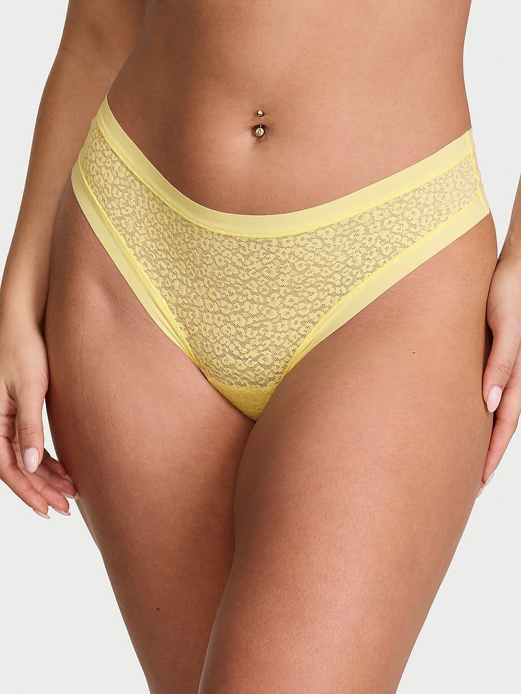 Tanga s leopardím vzorem jako Leopard. Produkt je žluté barvy a pochází z kolekce No-Show.
