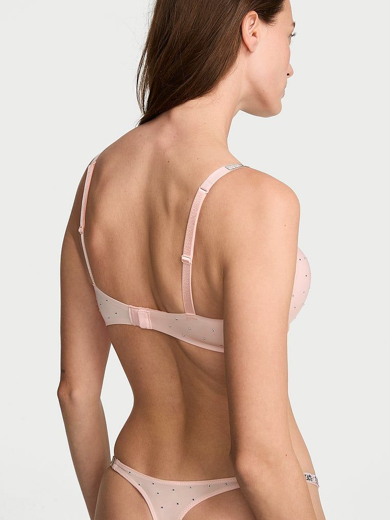 Push-up zvětšující podprsenka 2 velikosti Bombshell lesk s ramínkem tečkou. Produkt je růžové barvy a pochází z kolekce Very Sexy.