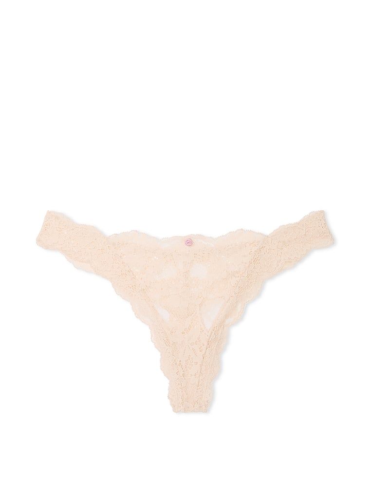 Krajková krajková tanga. Produkt je béžový a pochází z kolekce Dream Angels.