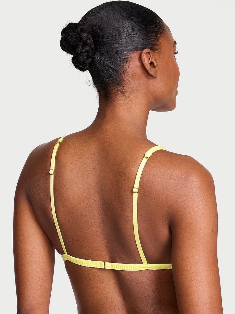 Podprsenka, podprsenka, satén, Tease Kiss. Produkt je žluté barvy a pochází z kolekce Victoria's Secret.