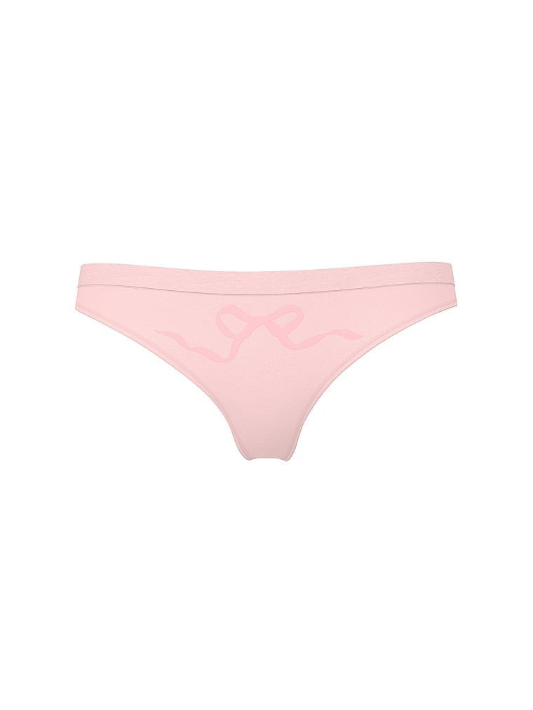 Tanga s bezešvou mašlí. Produkt má růžovou barvu a pochází z kolekce Bezešvé.