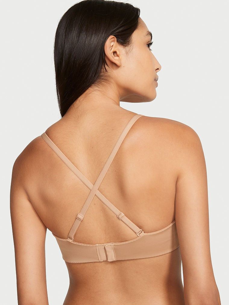 Mírně vyztužená podprsenka bez ramínek. Produkt je béžový a pochází z kolekce Body by Victoria.