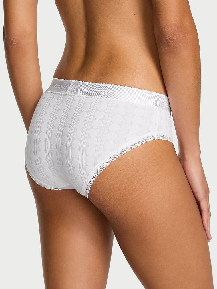 Bavlněné kalhotky se srdíčky a logem Heart Pointelle Hiphugger. Produkt je bílé barvy a pochází z kolekce Cotton.