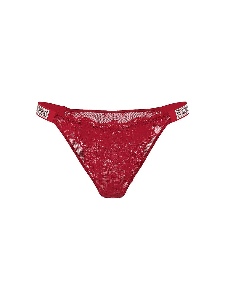 Brazilské krajkové kalhotky s brazilskými proužky Shine Strap. Produkt má červenou barvu a pochází z kolekce Very Sexy.