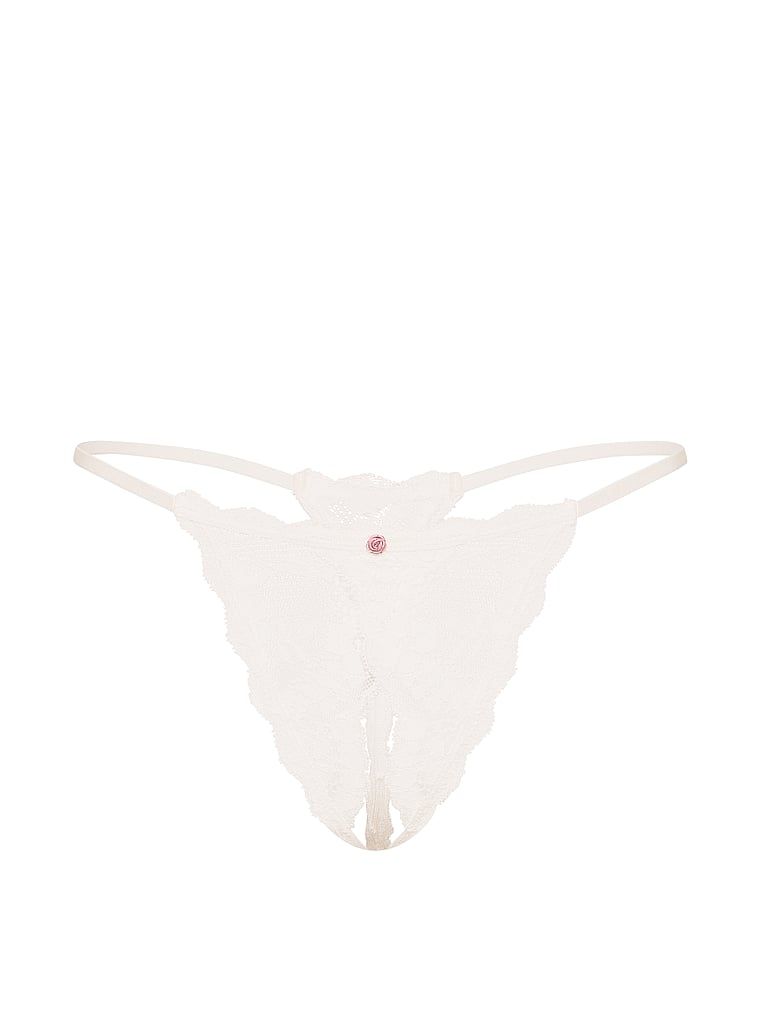 Peekaboo krajková tanga bez kroku. Produkt je bílý a pochází z kolekce Dream Angels.