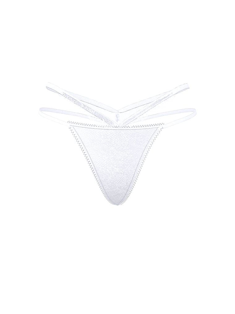 Tanga s krajkou a výstřihy po stranách. Produkt je bílé barvy a pochází z kolekce Very Sexy.