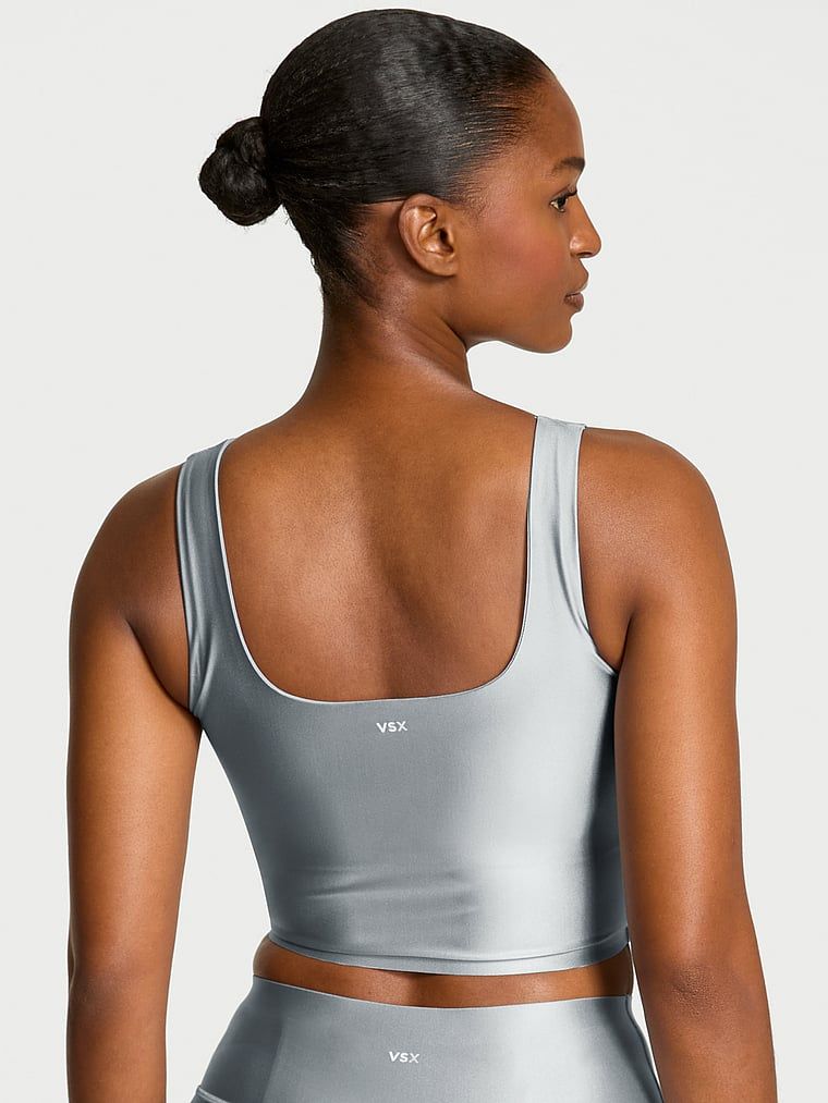 Sportovní top z lesklého materiálu VSX GlossyTech. Produkt je šedé barvy a pochází z kolekce VSX.