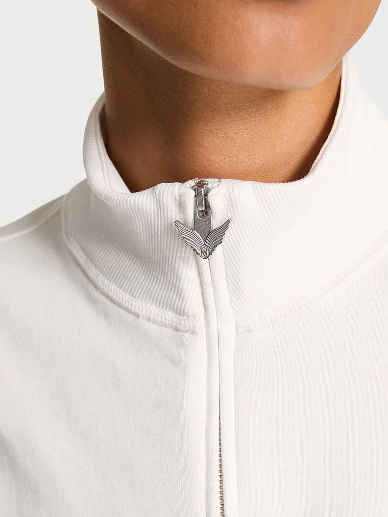 Status Terry krátká mikina na zip. Produkt je bílé barvy a pochází z kolekce Angel Essentials.