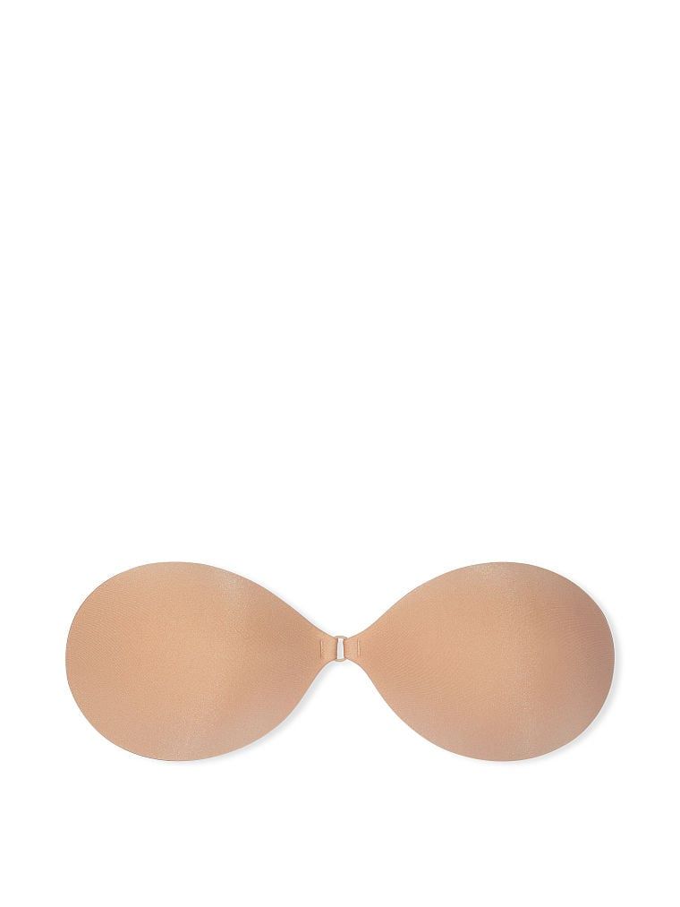 Silikonová samonosná podprsenka bez ramínek. Produkt je béžový a pochází z kolekce Victoria's Secret Bare.