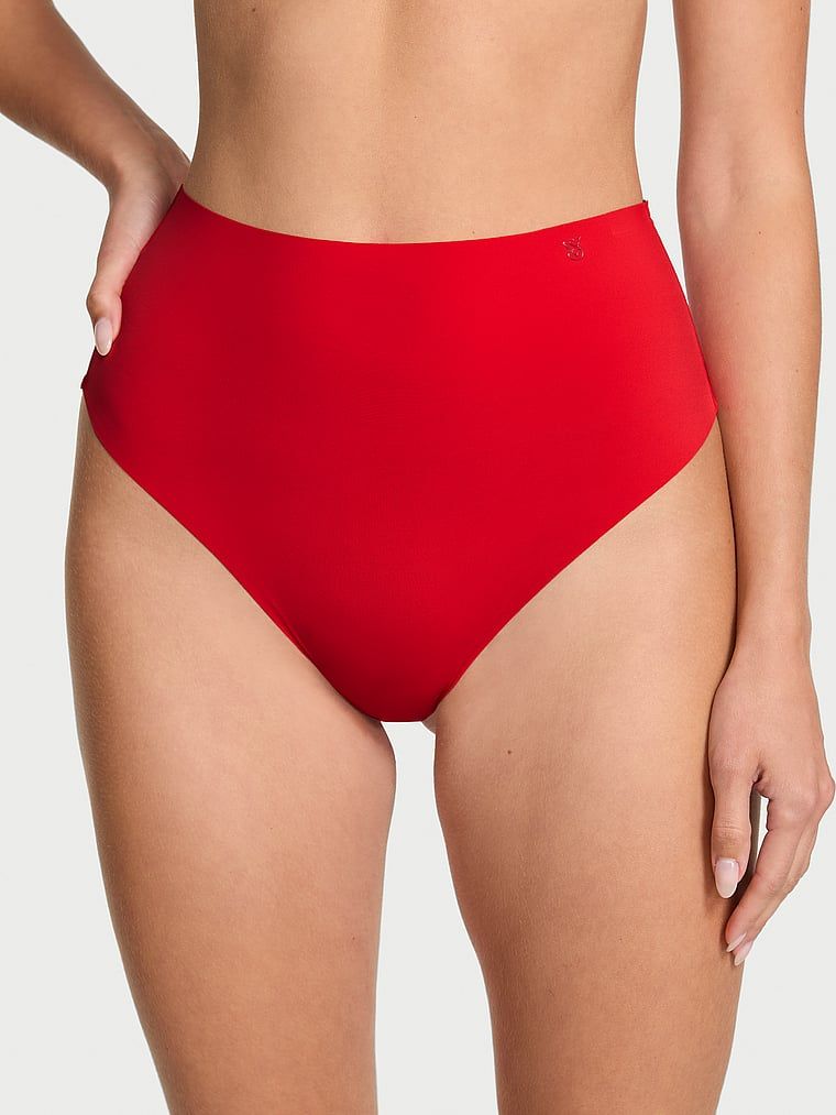 Bezešvá tanga s vysokým pasem No-Show. Produkt je červené barvy a pochází z kolekce No-Show.