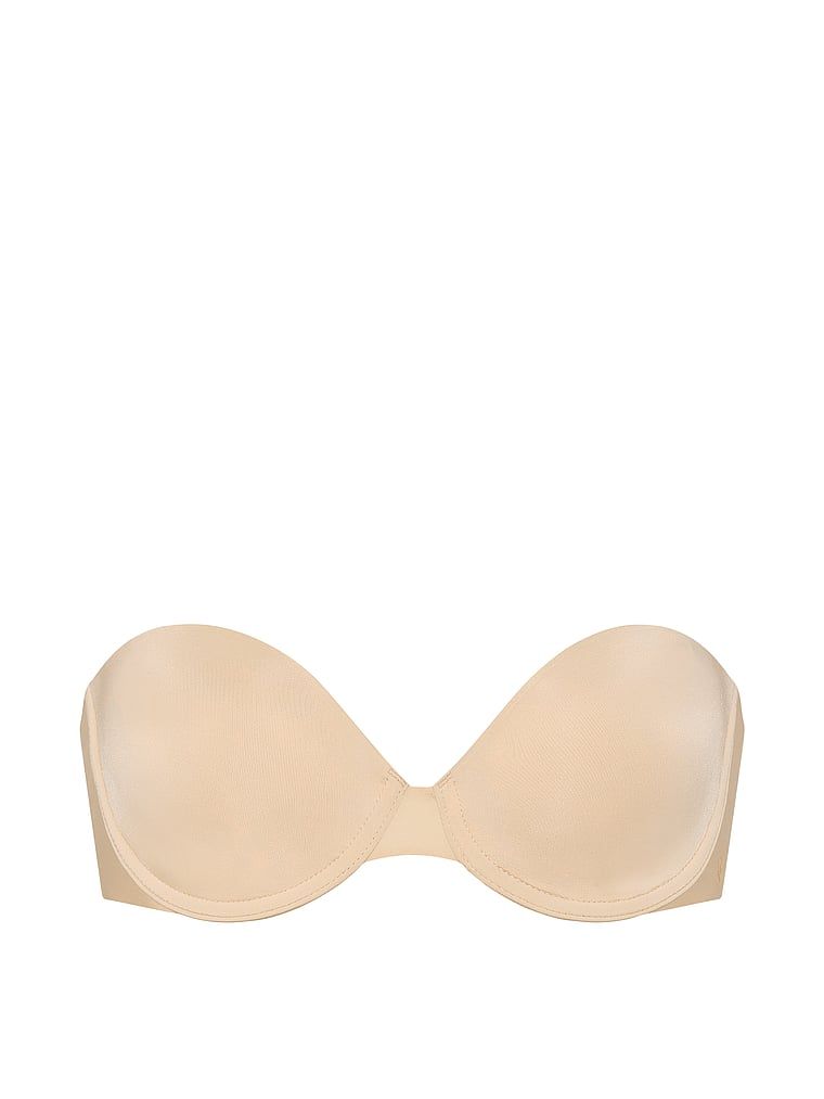 Podprsenka bez ramínek s mírně vypolstrovanými ramínky. Produkt je béžové barvy a pochází z kolekce Invisible by Victoria's Secret.
