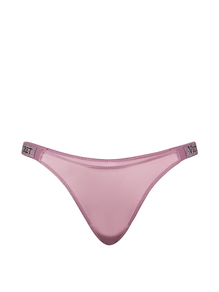 Tanga s lesklými ramínky Shine Strap. Produkt je růžové barvy a pochází z kolekce Very Sexy.