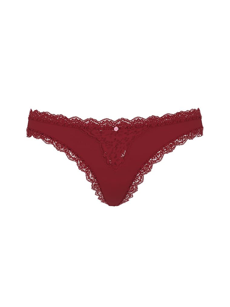 Tanga s krajkou Lace Trim. Výrobek je červené barvy a pochází z kolekce Dream Angels.