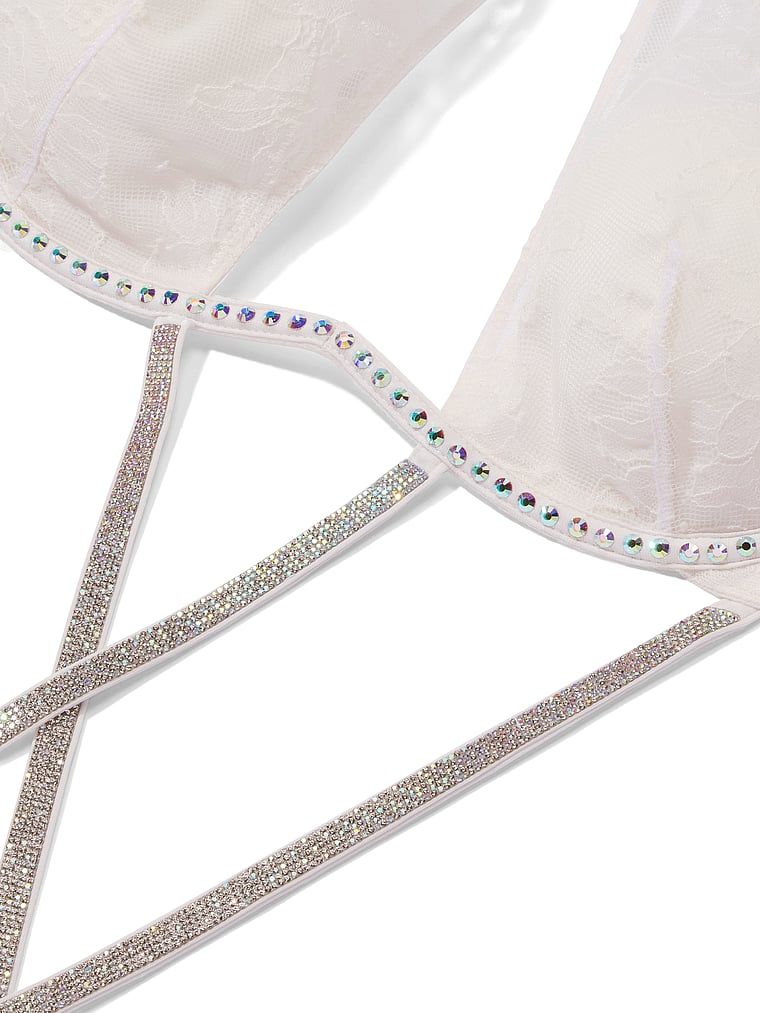 Body s lesklým Gradient Shine Strappy. Produkt je bílé barvy a pochází z kolekce Very Sexy.