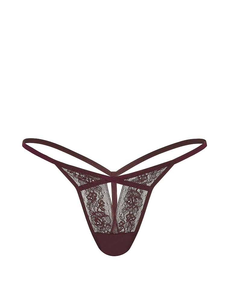 Tanga s výstřihem a krajkou s páskami. Produkt je fialové barvy a pochází z kolekce Very Sexy.