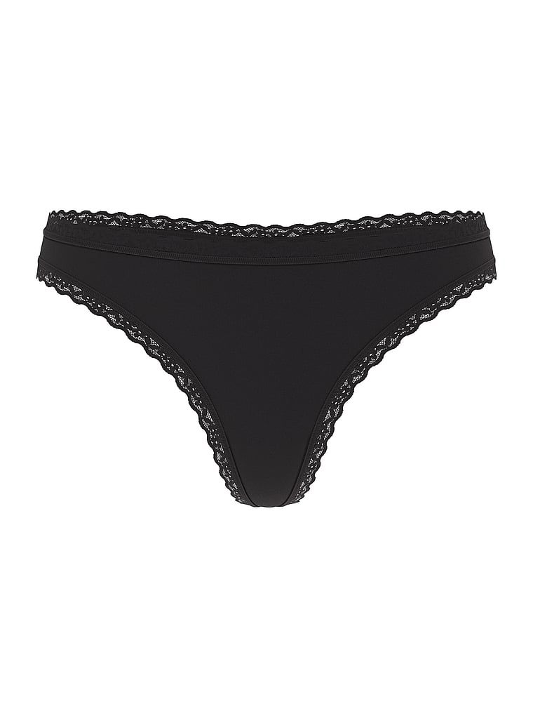 Bavlněná tanga s krajkou na krajkách v pase. Produkt je černý a pochází z kolekce Lacie.