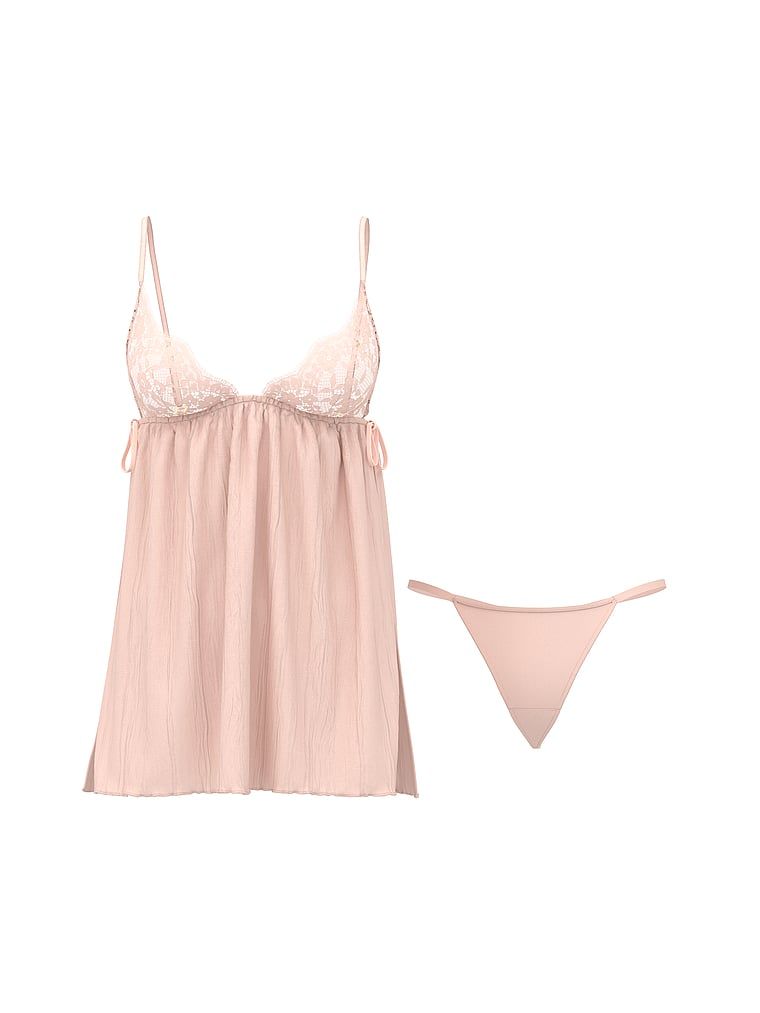 Skládaná spodnice a tanga Babydoll. Produkt je růžové barvy a pochází z kolekce Dream Angels.