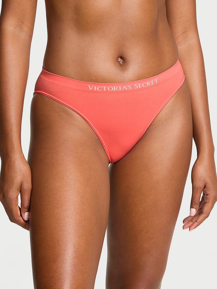 Bezešvové bikinové kalhotky. Produkt je oranžové barvy a pochází z kolekce Seamless.