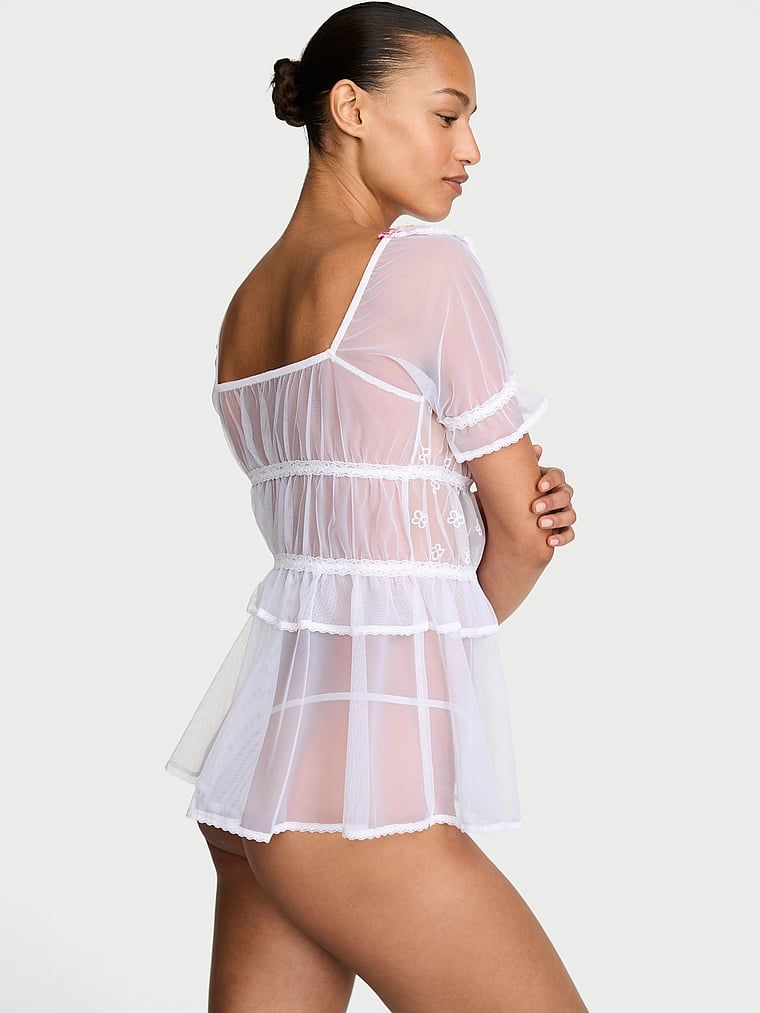 Průhledné tričko a tanga Butterflies Babydoll. Produkt je vzorovaný a pochází z kolekce Dream Angels.