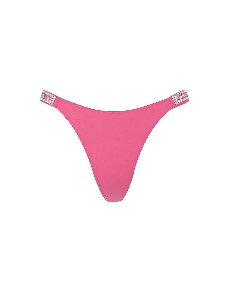 Tanga s lesklými ramínky Shine Strap. Produkt je růžové barvy a pochází z kolekce Very Sexy.