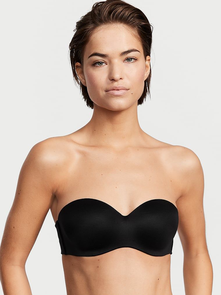 Mírně vyztužená podprsenka bez ramínek. Produkt je černý a pochází z kolekce Body by Victoria.