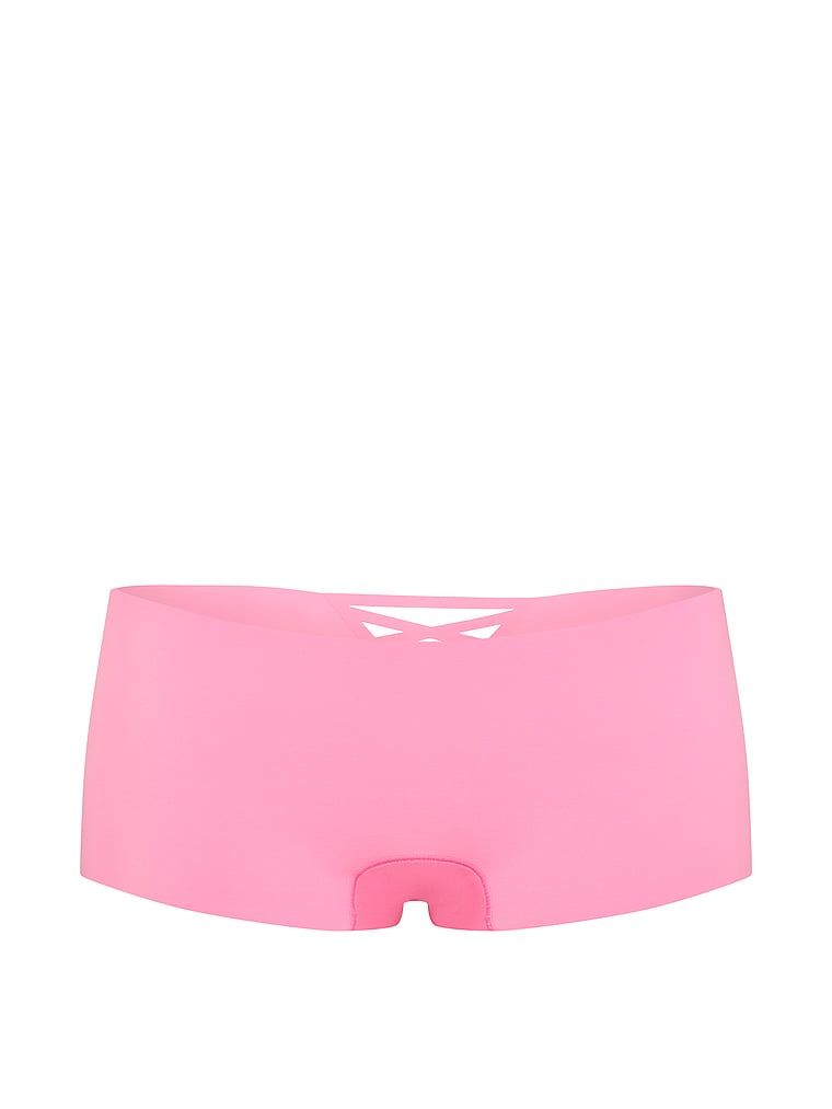 Bezšvové kraťasy s ramínky vzadu No-Show Strappy Boyshorts. Produkt je růžové barvy a pochází z kolekce No-Show.