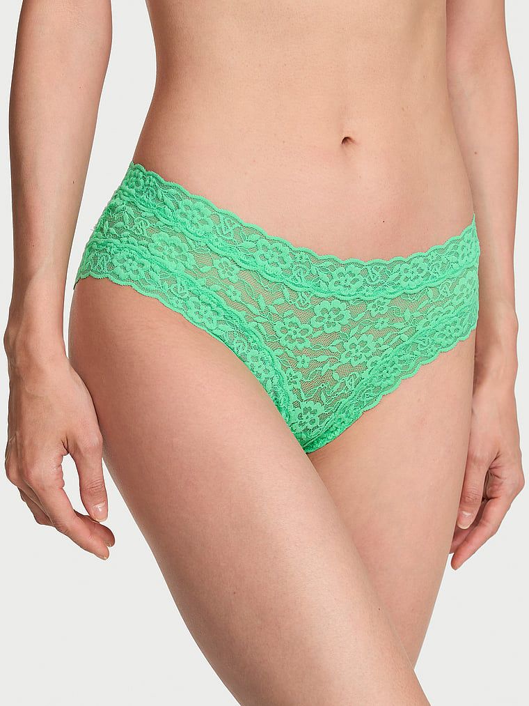 Krajkové kalhotky s ramínky vzadu Blossom Cheeky. Produkt je zelené barvy a pochází z kolekce Lacie.