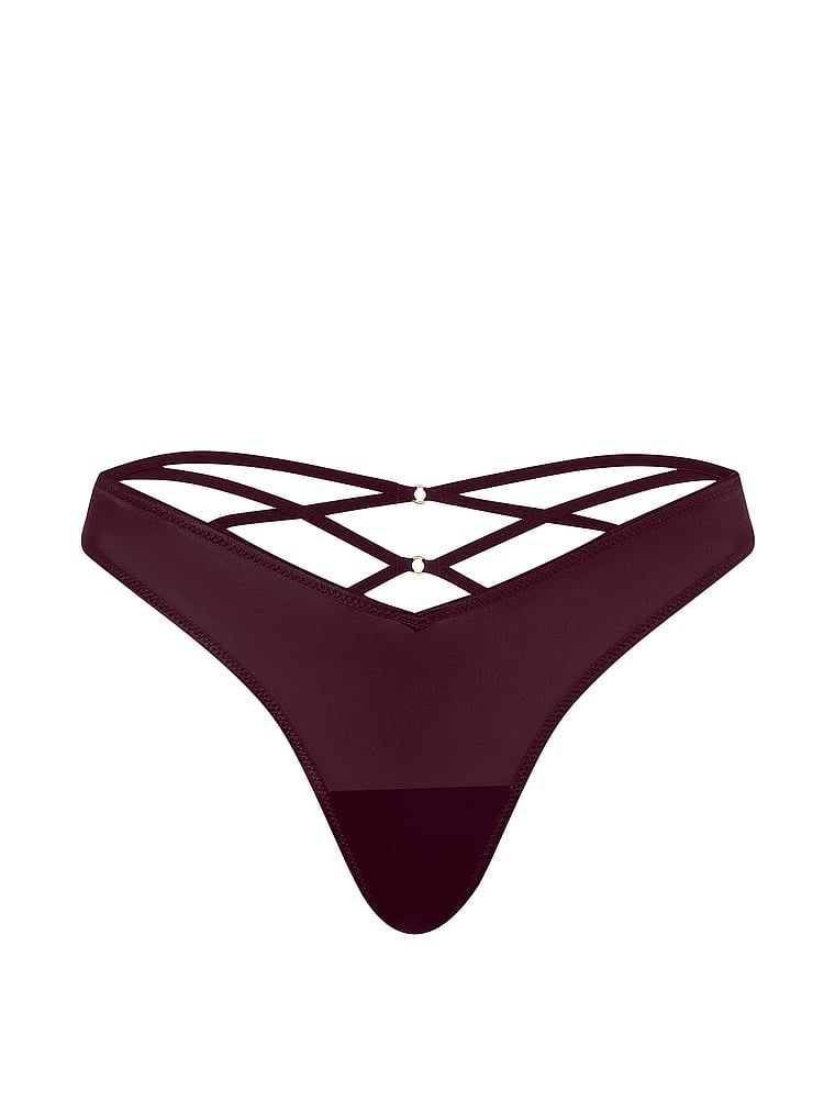 Tanga s ramínky vzadu a vysoko střiženými rameny na zádech. Produkt je fialové barvy a pochází z kolekce Very Sexy.