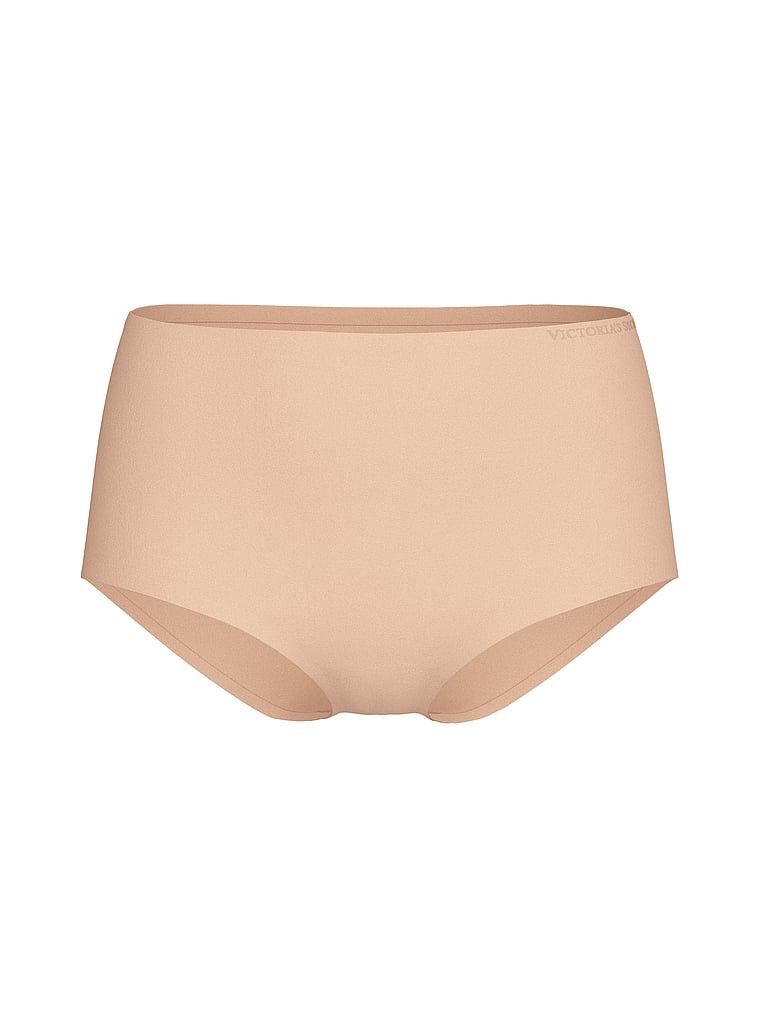 Pružné kalhotky s vysokým pasem. Produkt je béžové barvy a pochází z kolekce Body by Victoria.