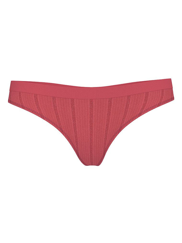 Bezešvá tanga. Produkt je zlatý a pochází z kolekce Bezešvé.