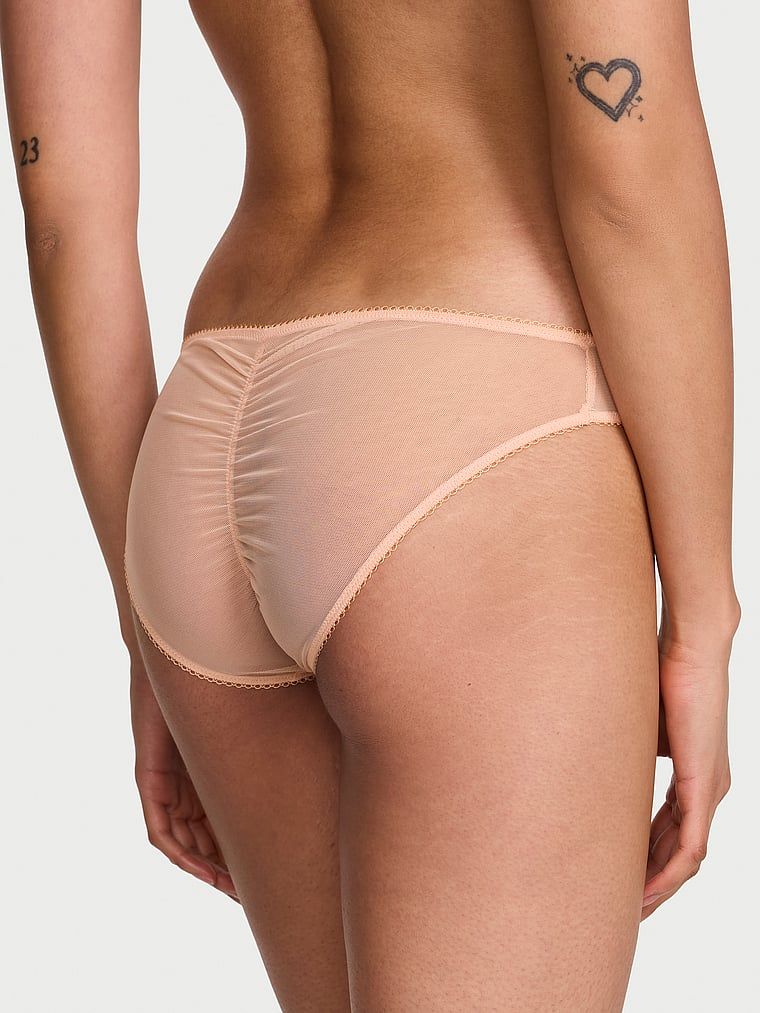 Sweet Melody bikiny síťované kalhotky. Produkt je béžové barvy a pochází z kolekce Dream Angels.