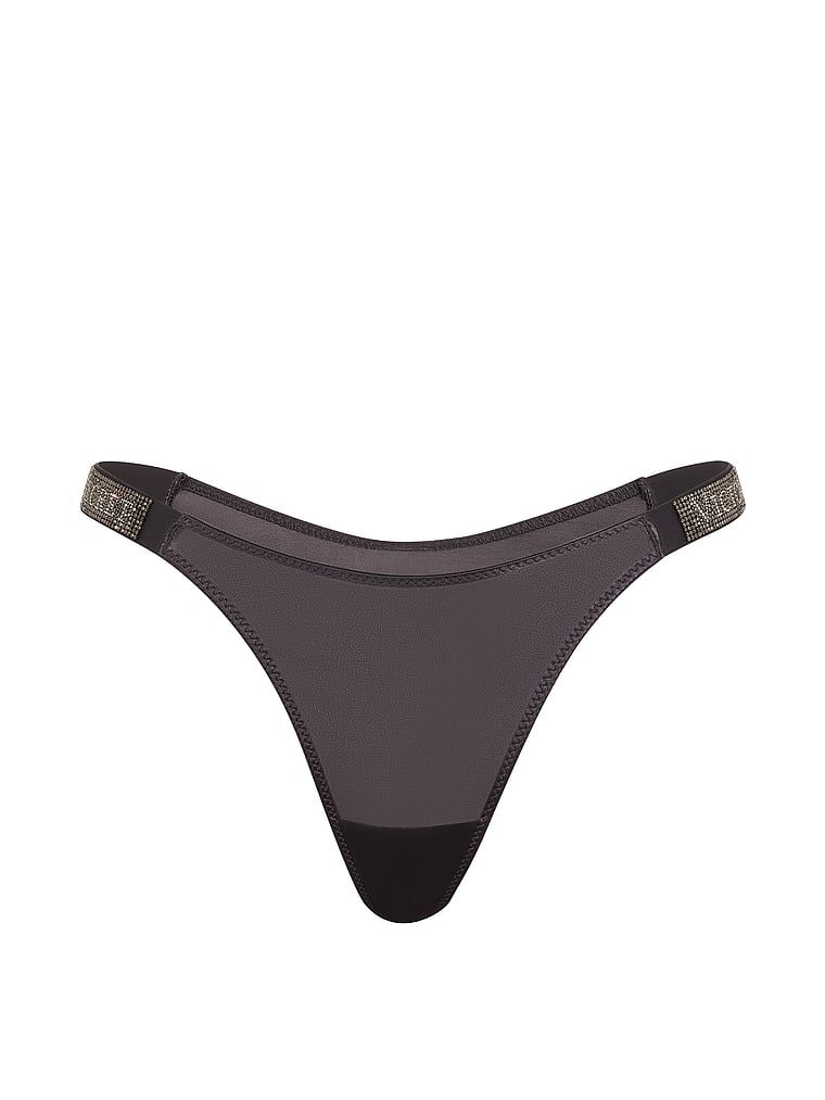 Tanga s lesklými ramínky Shine Strap. Produkt je šedobarevný a pochází z kolekce Very Sexy.