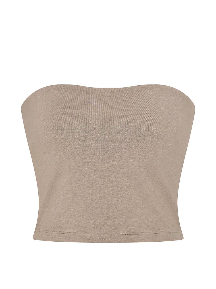 Bavlněný top bez ramínek bez ramínek. Produkt je béžové barvy a pochází z kolekce Angel Essentials.