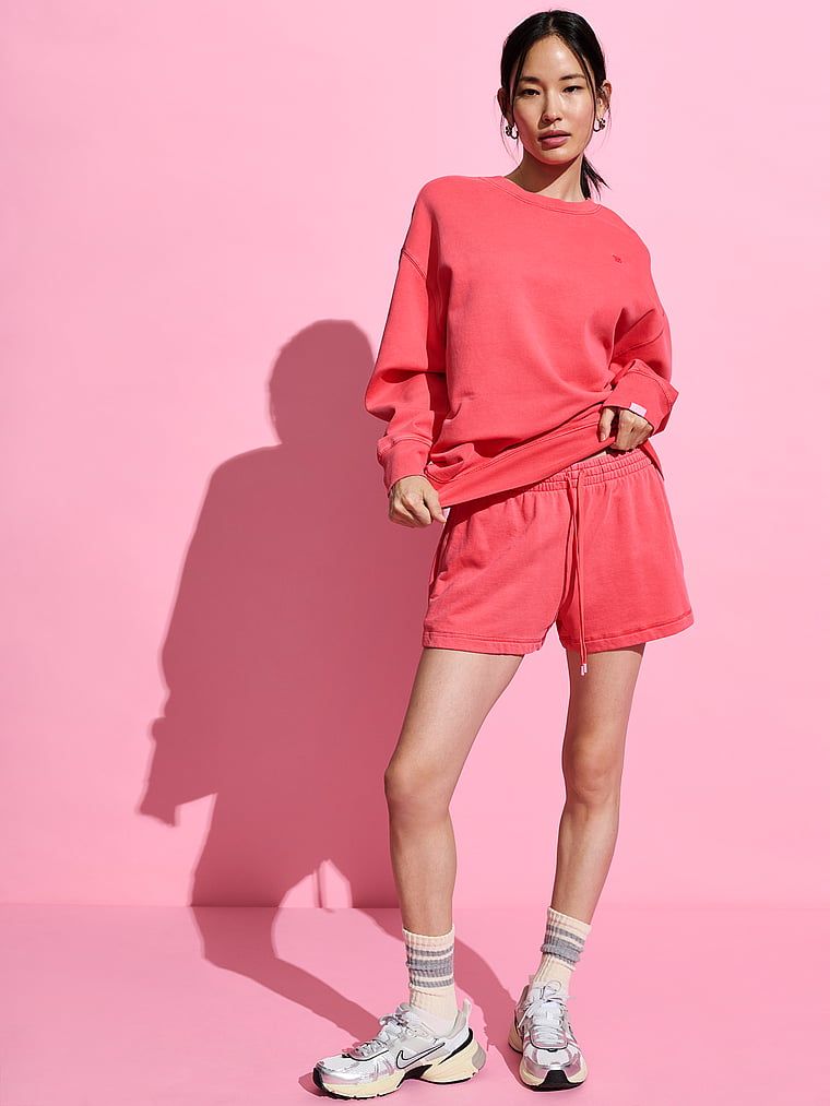 Beznádežná bavlněná mikina z fleecové tkaniny. Produkt je růžové barvy a pochází z kolekce Angel Essentials.