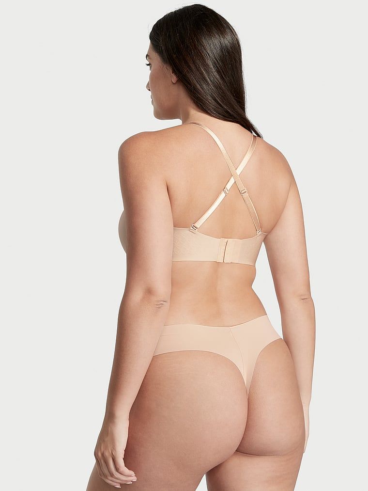 Mírně vyztužená podprsenka bez ramínek. Produkt je béžový a pochází z kolekce Victoria's Secret Bare.