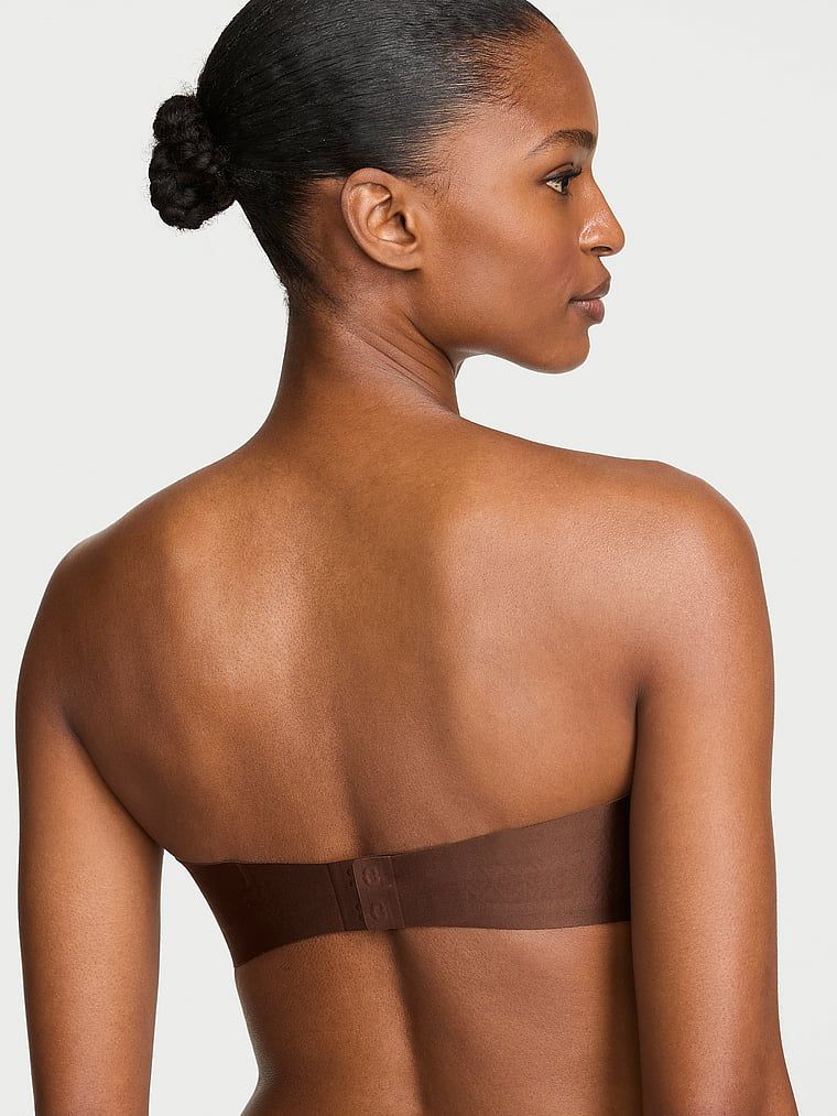 Podprsenka bez ramínek, mírně vycpávaná. Produkt je hnědé barvy a pochází z kolekce Invisible by Victoria's Secret.