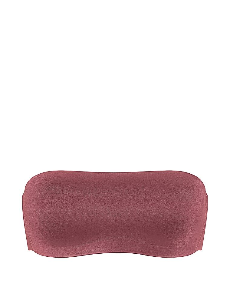 Bandeau podprsenka bez ramínek a s kosticí s klikami. Produkt je růžové barvy a pochází z kolekce Invisible by Victoria's Secret.