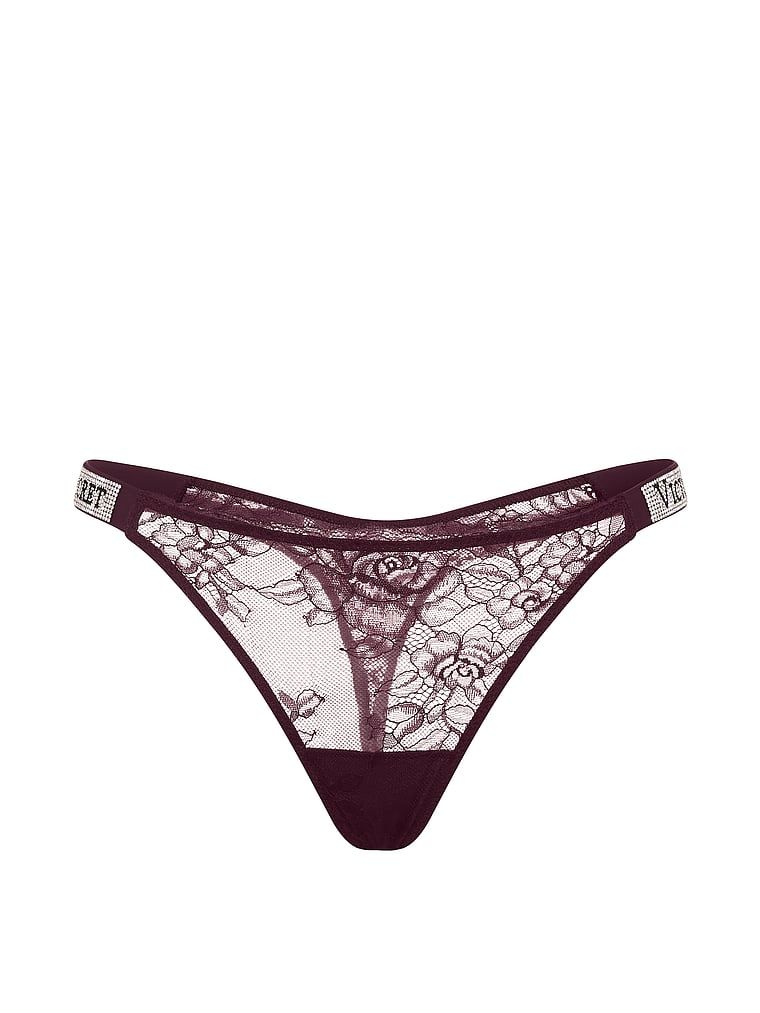 Krajková tanga s lesklými ramínky Shine Strap. Produkt je fialové barvy a pochází z kolekce Very Sexy.