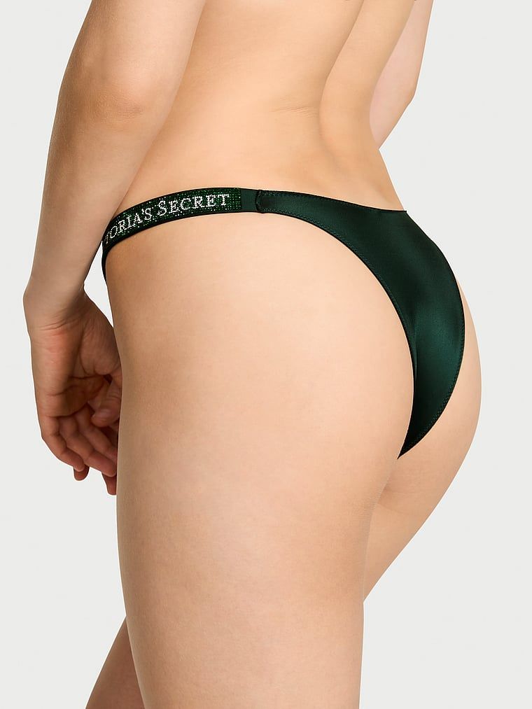Brazilské kalhotky s brazilskými proužky Shine Strap. Produkt má zelenou barvu a pochází z kolekce Very Sexy.