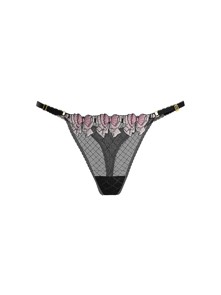 Tanga s nastavitelnými ramínky Tease Bow. Produkt je vzorovaný a pochází z kolekce Victoria's Secret.