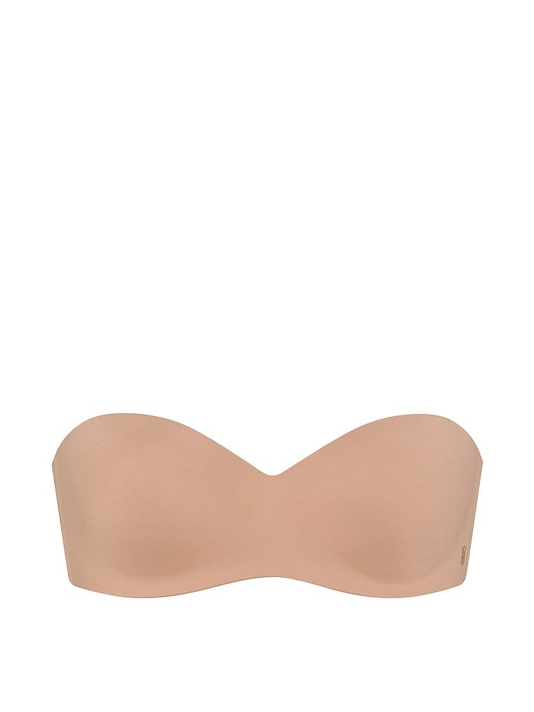 Sweetheart podprsenka bez ramínek a mírně vycpávaná podprsenka. Produkt je béžové barvy a pochází z kolekce Invisible by Victoria's Secret.