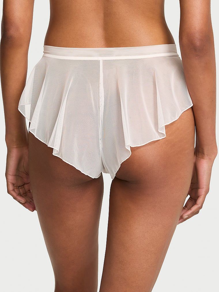 Brazilské kalhotky s krajkovými volánky. Produkt je bílý a pochází z kolekce Dream Angels.