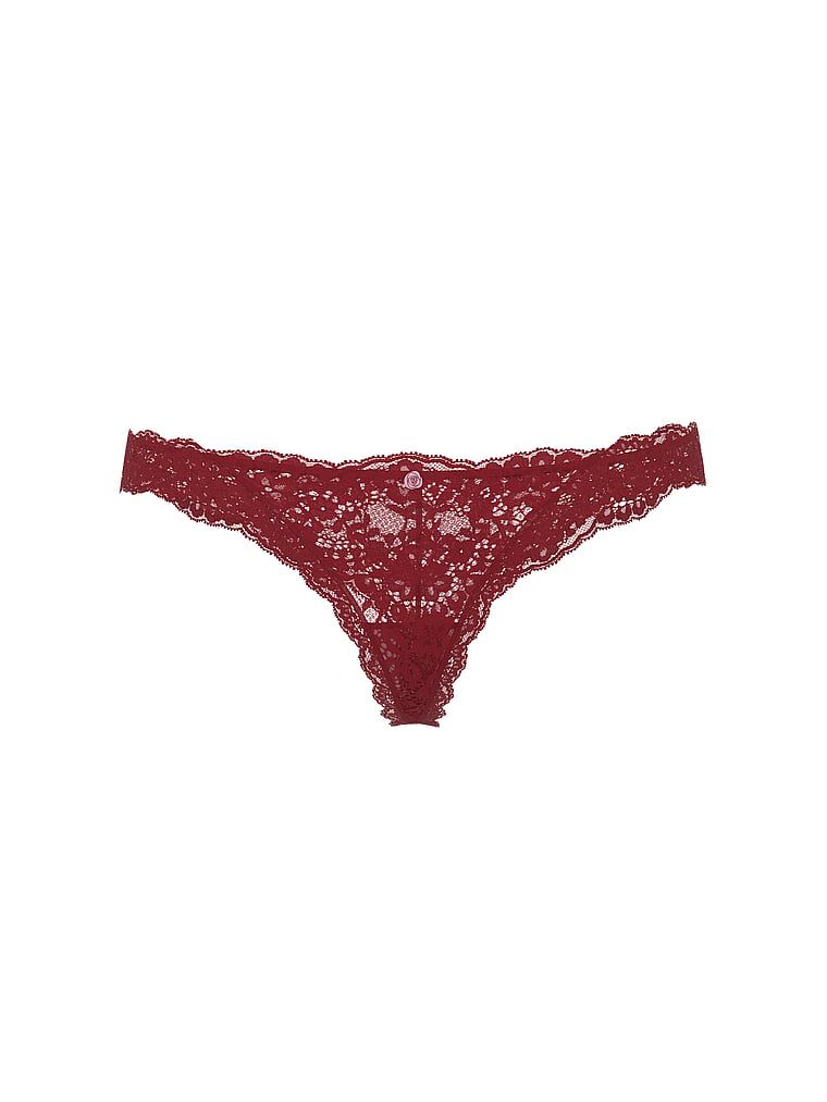 Krajková krajková tanga. Výrobek je červené barvy a pochází z kolekce Dream Angels.