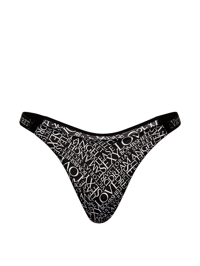 Tanga s lesklými ramínky Shine Strap. Produkt má vzorovanou barvu a pochází z kolekce Very Sexy.