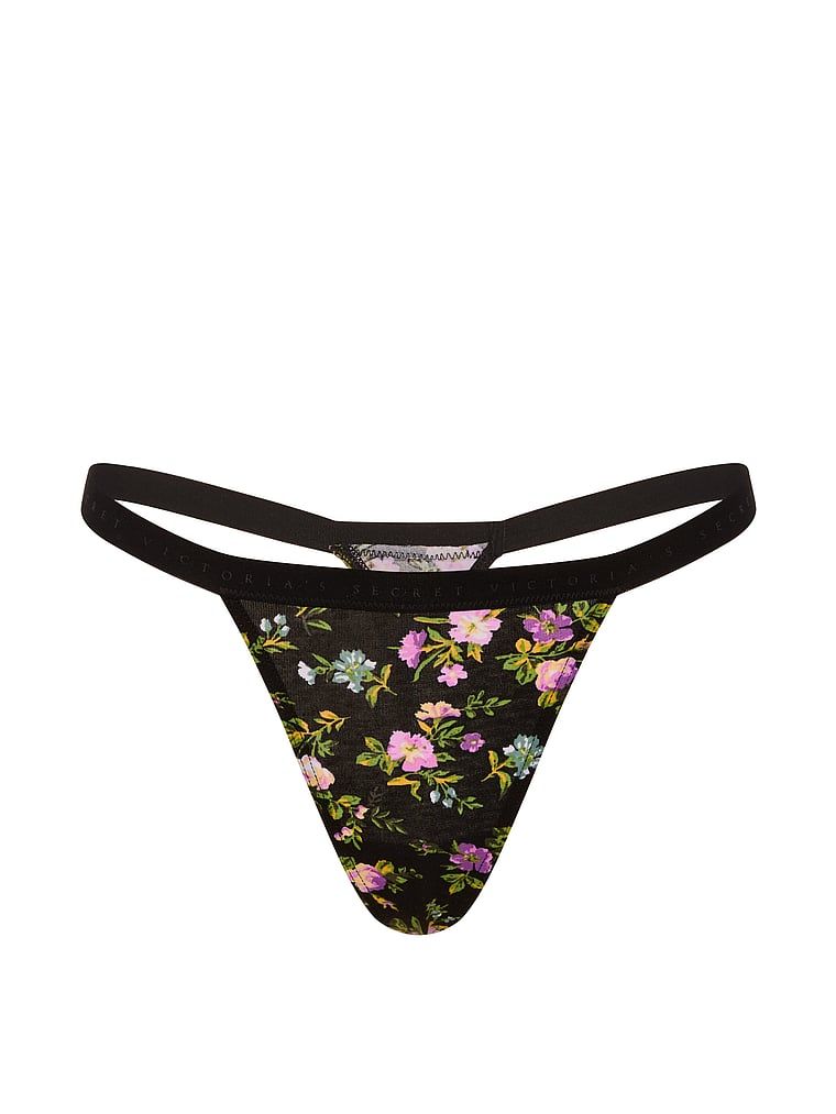 Pružné bavlněné tanga. Produkt je květinové barvy a pochází z kolekce Victoria's Secret.