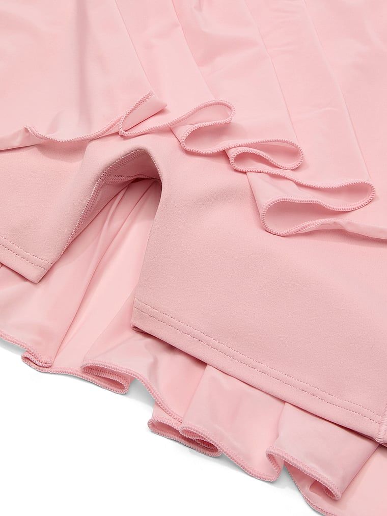 Sportovní tenisová sukně s VSX Elevate Sheer Radiance šortkami. Produkt je růžové barvy a pochází z kolekce VSX.