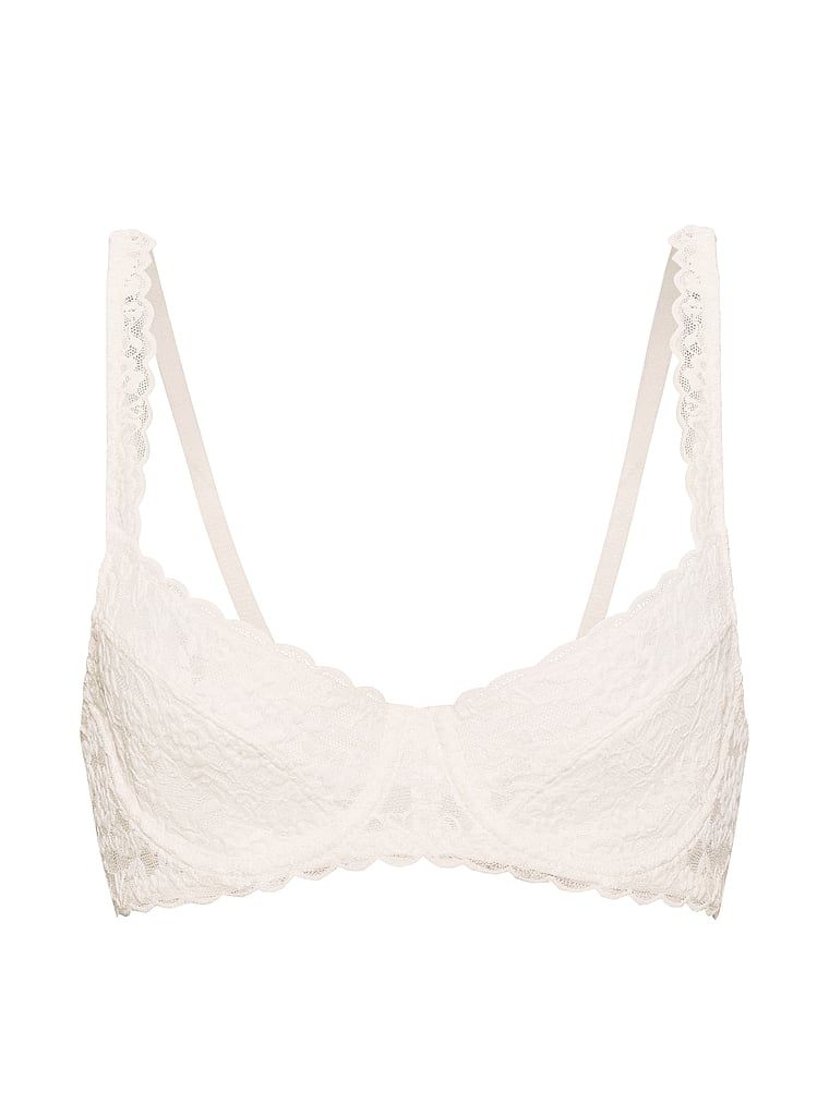 Krajková podprsenka s balkonem bez vycpávky. Produkt je bílé barvy a pochází z kolekce Victoria's Secret.