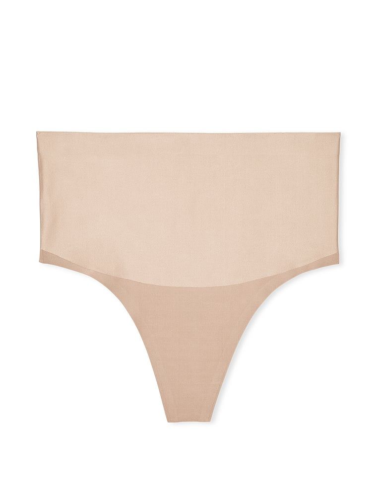 Vyhlazující tvarující tanga s vysokým pasem. Produkt je béžový a pochází z kolekce Body by Victoria.