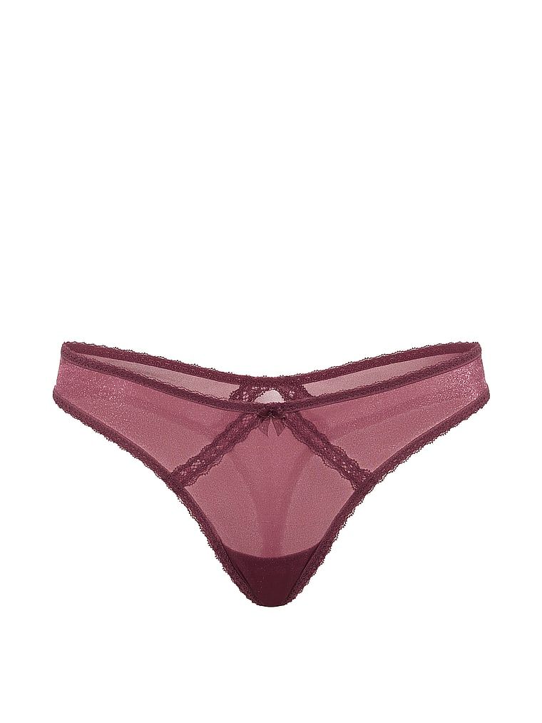 Sheer Shimmer Shimmer Shiny Thong. Produkt je růžové barvy a pochází z kolekce Dream Angels.